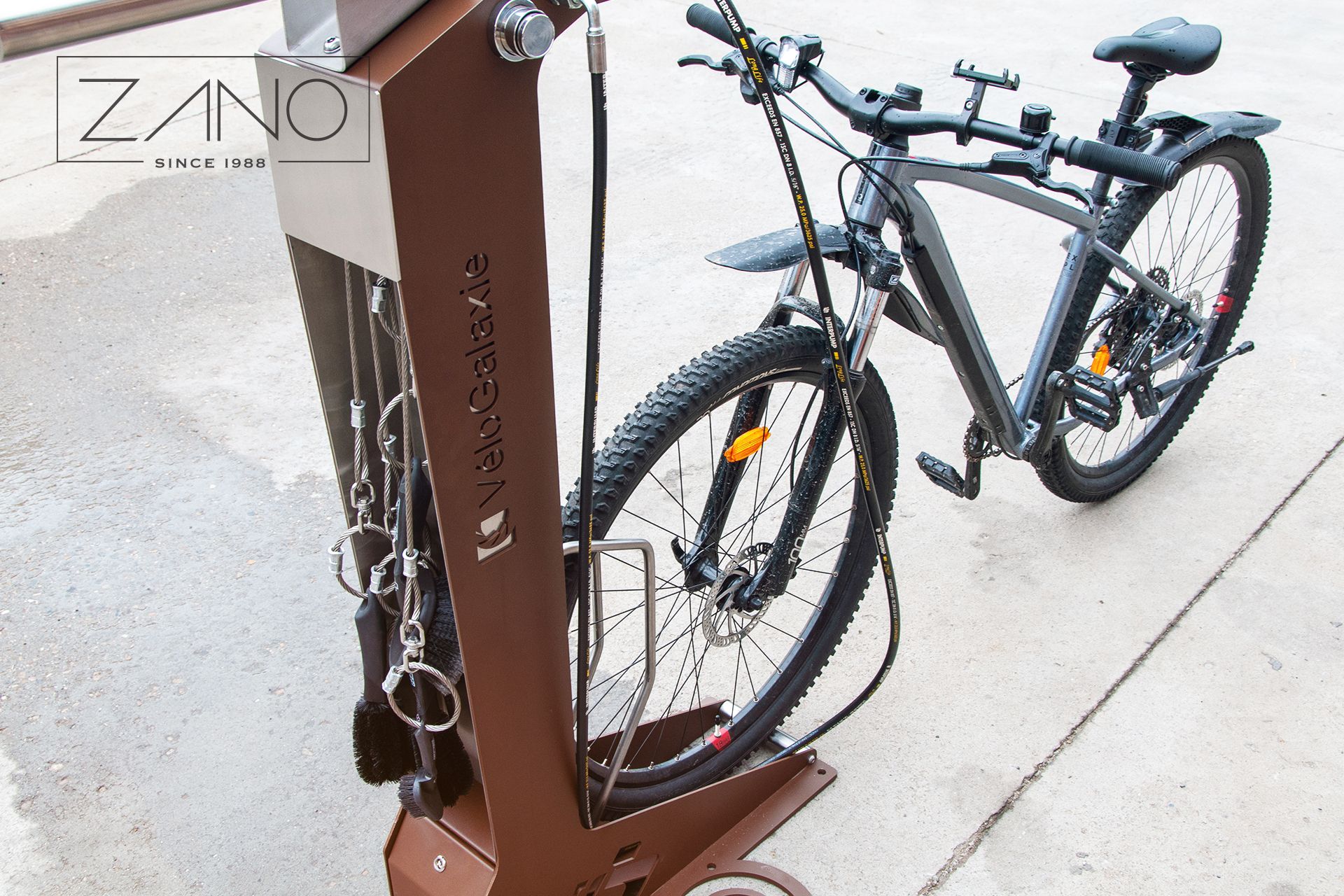 Bike cleaning station with bike rack